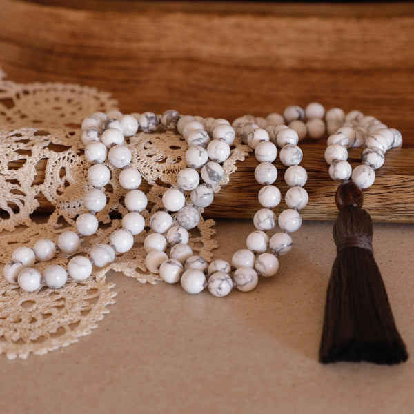 Calm Mala Beads. Hand-knotted with beautiful, untreated, high-grade Howlite beads, featuring a wooden guru bead and handmade cotton tassel.